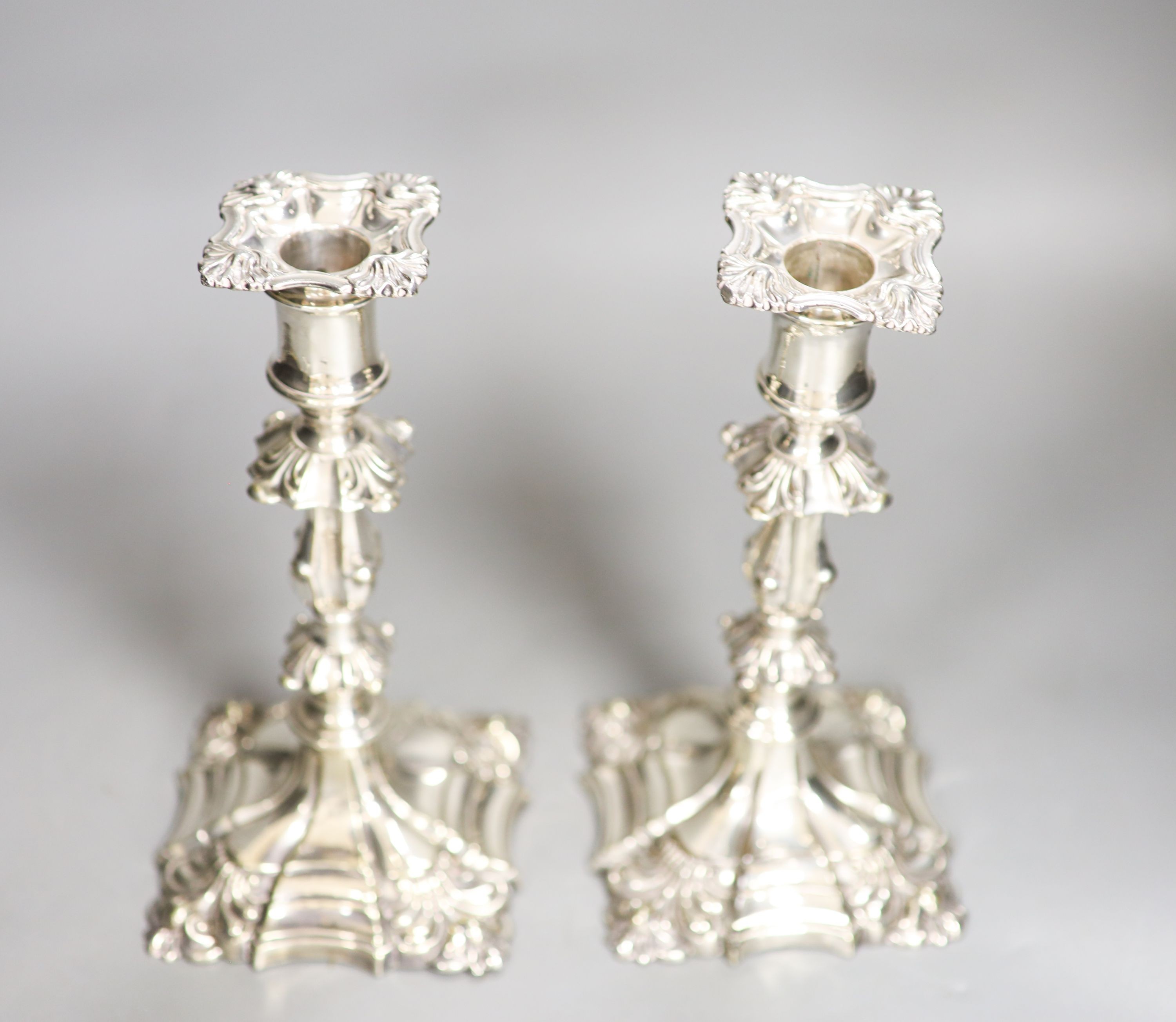 A pair of Victorian silver plated candlesticks 22cm